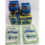 DAIYA TOYS JAPAN TRUCK ASSEMBLY SETS (2) - both appear complete, in original boxes