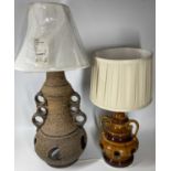 LAVA EFFECT POTTERY TABLE LAMP & ONE OTHER, 77cms overall H with shade the largest lamp