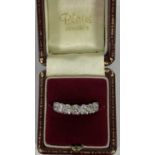 18CT WHITE GOLD SEVEN STONE DIAMOND HALF ETERNITY RING, collective diamond estimate 1.4 carats, 3.