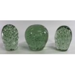 VICTORIAN GREEN GLASS DUMP PAPERWEIGHTS (3) - all having interior bubble decoration, 12cms H the