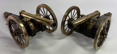 NAPOLEONIC BRASS & WOOD MODEL CANNONS, A PAIR - probably mid 20th Century, 13.5cms H, 41.5cms