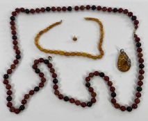 VINTAGE AMBER BEAD NECKLACE and other similar type jewellery, the vintage example 37.5cms L,