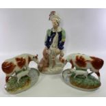 STAFFORDSHIRE POTTERY ORNAMENTS (3) to include a flatback figurine titled 'The Lion Slayer', 41cms H