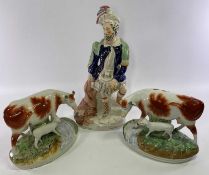 STAFFORDSHIRE POTTERY ORNAMENTS (3) to include a flatback figurine titled 'The Lion Slayer', 41cms H