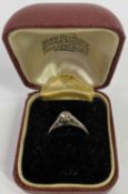 18CT GOLD & PLATINUM SOLITAIRE DIAMOND RING, 0.15 carat stone in a coronet claw platinum mount and