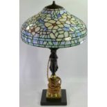 REPRODUCTION FRENCH GILT BRASS, MARBLE AND BRONZED FIGURAL TABLE LAMP with Tiffany style lamp shade,