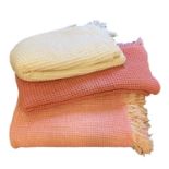 TRADITIONAL WAFFLE BLANKETS (3) - two pink (reversible) and a cream coloured