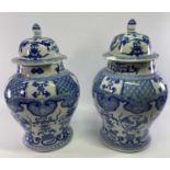 CHINESE BLUE & WHITE JARS & COVERS - decorated with dragons, birds and objects, underglaze blue