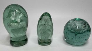 VICTORIAN GREEN GLASS DUMP PAPERWEIGHTS (3) - to include a waisted form example with interior flower