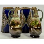 ROYAL DOULTON LAMBETH STONEWARE JUGS, A PAIR - 16.5cms tall and a pair of other similar period
