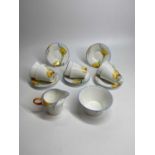 SHELLEY REGENT 12229 POPPIES PATTERN TEAWARE - 14 pieces to include 6 cups, 6 saucers, milk jug