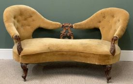 VICTORIAN CARVED & DOUBLE BACK SALON SETTEE button upholstered on cabriole supports and castors,