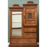 EDWARDIAN POLLARD TYPE OAK COMBINATION WARDROBE, having a single mirrored door, carved detail to a