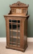 GOTHIC CARVED OAK NARROW BOOKCASE with railback and mirrored top over a single glazed door and