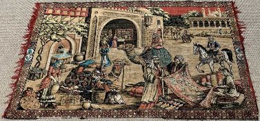 WALL HANGING SILK/TAPESTRY - Eastern scene featuring camels and carpet sellers, 180 x 120cms