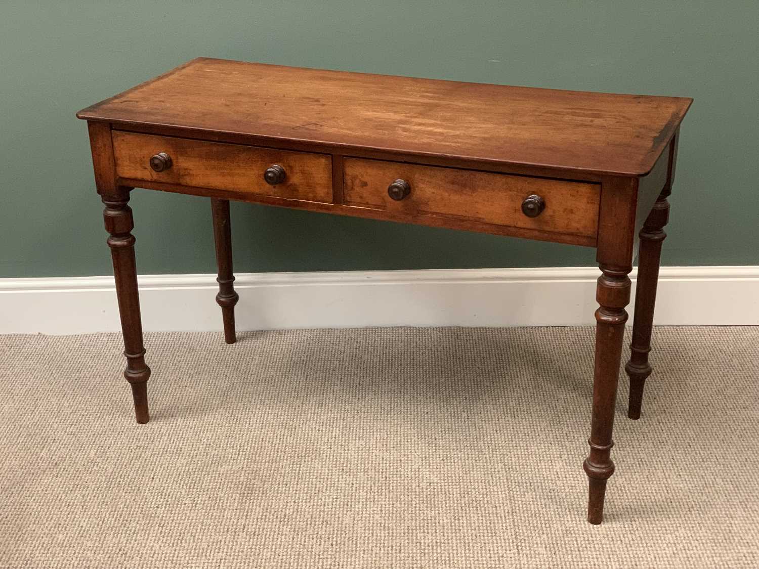 VICTORIAN MAHOGANY WRITING TABLE with two drawers, on turned supports, 78cms H, 120cms W, 55cms D
