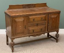 EDWARDIAN OAK SIDEBOARD with railback, two cupboard doors and three central drawers, on turned and