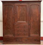 VICTORIAN MAHOGANY TRIPLE WARDROBE, the doors flanking a central section with three drawers over two