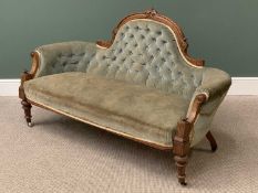 VICTORIAN SALON COUCH with carved, shaped and buttoned back, on turned and block supports with