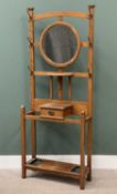 EARLY 20th CENTURY OAK HALLSTAND with central circular mirror, multiple hooks, central drawer and