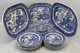 BLUE & WHITE WILLOW PATTERN DRESSER SET - 21 pieces to include four various meat platters, 2 x 46cms