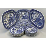 BLUE & WHITE WILLOW PATTERN DRESSER SET - 21 pieces to include four various meat platters, 2 x 46cms