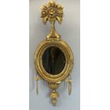 GILT FRAMED WALL MIRROR, French Louis XV style with foliage decoration to the top and candle