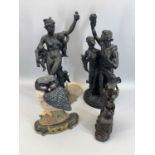 COMPOSITION DECORATIVE STATUES IN BLACK, one other depicting African women and a reproduction cast