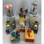 TIN PLATE CAROUSEL & CIRCUS TYPE ACTION TOYS (8) - all with original boxes, all mid to late 20th