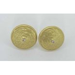 18 CT GOLD CIRCULAR DOMED EARRINGS, A PAIR - each with a tiny diamond centre, butterfly fixings,