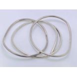 PLAIN 925 SILVER ROUND FORM BANGLES (3) - believed London 1959, 53.6grms, possibly by Kit Heath