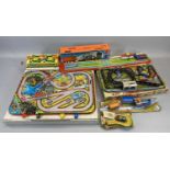 TIN PLATE CLOCKWORK CAR & RAILWAY PLAY SETS (6) - all boxed, mid to late 20th Century to include