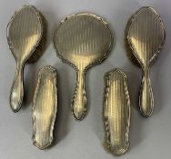 ART DECO PERIOD 5 PIECE SILVER DRESSING TABLE SET - comprising hand mirror, two large brushes and