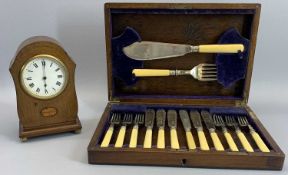 EDWARDIAN INLAID MAHOGANY MANTEL CLOCK - on brass ball feet with winding key and an oak cased