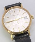 VINTAGE 9CT GOLD CASED GARRARD QUARTZ CALENDAR PRESENTATION WRISTWATCH - in original box,