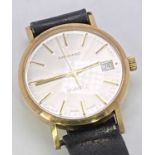 VINTAGE 9CT GOLD CASED GARRARD QUARTZ CALENDAR PRESENTATION WRISTWATCH - in original box,