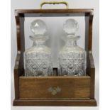 TANTALUS - a reproduction two bottle example with key, no makers marks, 36 x 27 x 14cms