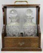 TANTALUS - a reproduction two bottle example with key, no makers marks, 36 x 27 x 14cms