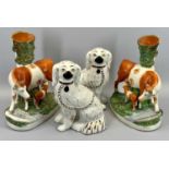 STAFFORDSHIRE POTTERY ORNAMENTS, TWO PAIRS - to include two gilt decorated white seated spaniels and