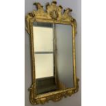 WILLIAMSBURG QUEEN ANN REPRODUCTION GILT FRAMED MIRROR - with eagle's head decorated crest, 104cms