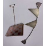 WHITE METAL BROOCH - irregularly shaped, having a pink/gold chequer design, 12grms, Maker's mark