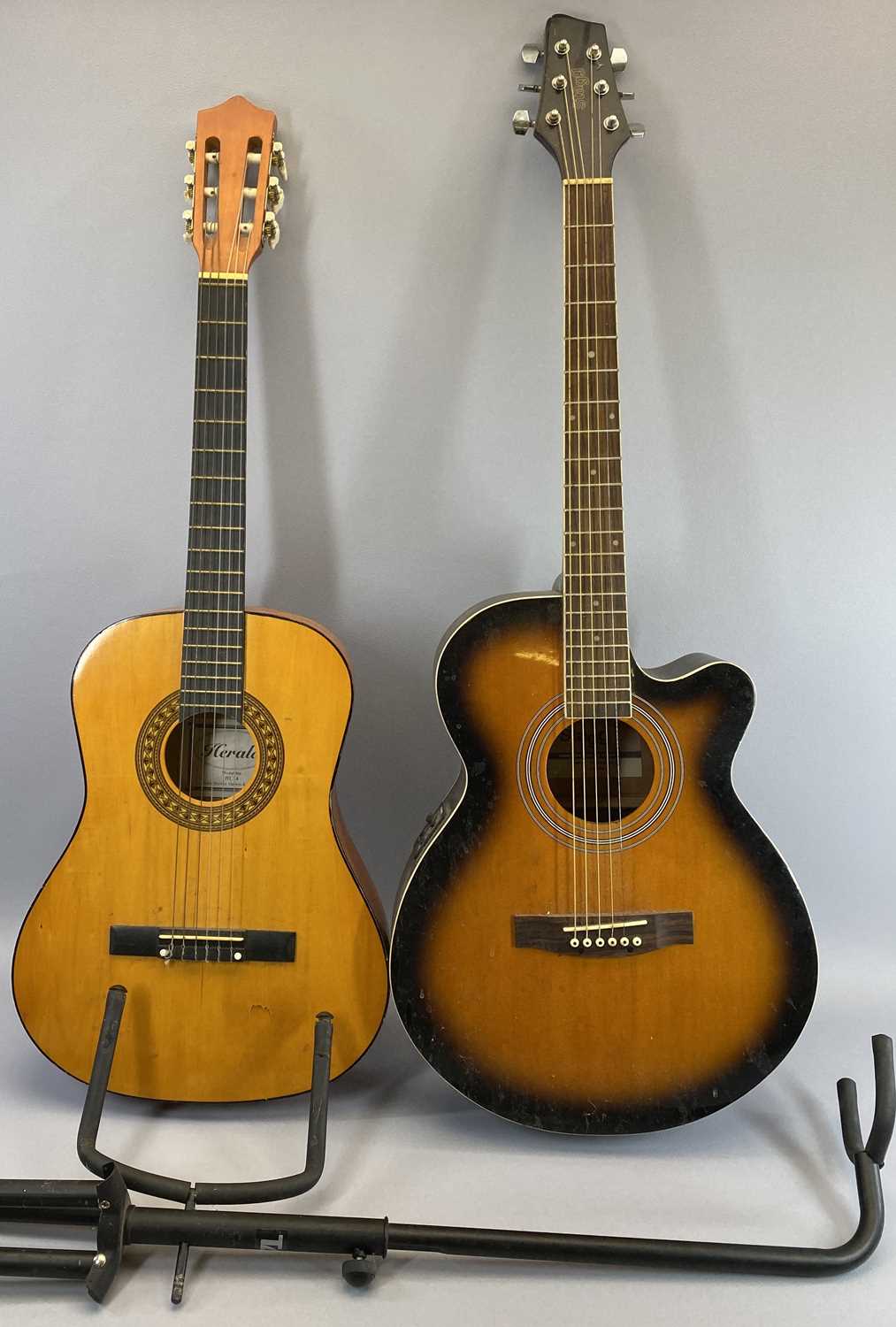 STAGG ACOUSTIC GUITAR & ONE OTHER along with a single guitar stand, interior label marked 'Stagg