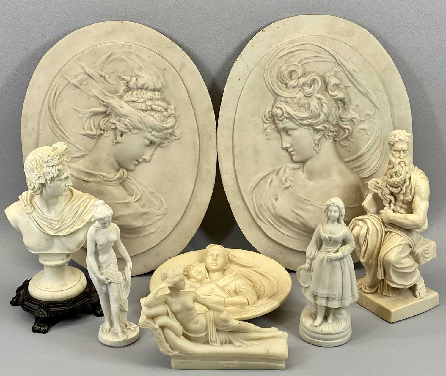 OVAL RELIEF MARBLE EFFECT PLAQUES (2) and a quantity of classically styled figural ornaments ETC, in