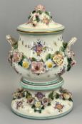 CHARENTON-SAINT-MAURICE (FRANCE) CERAMIC TWIN-HANDLED FLORAL ENCRUSTED JAR & COVER - on a pedestal