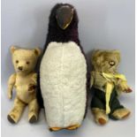 VINTAGE TEDDY BEARS (2) and a stuffed toy penguin, both bears appear in well playworn condition,