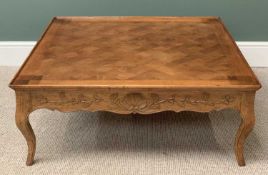 ITALIAN HARDWOOD COFFEE TABLE with parquet block detail to the top and carved shell with floral swag