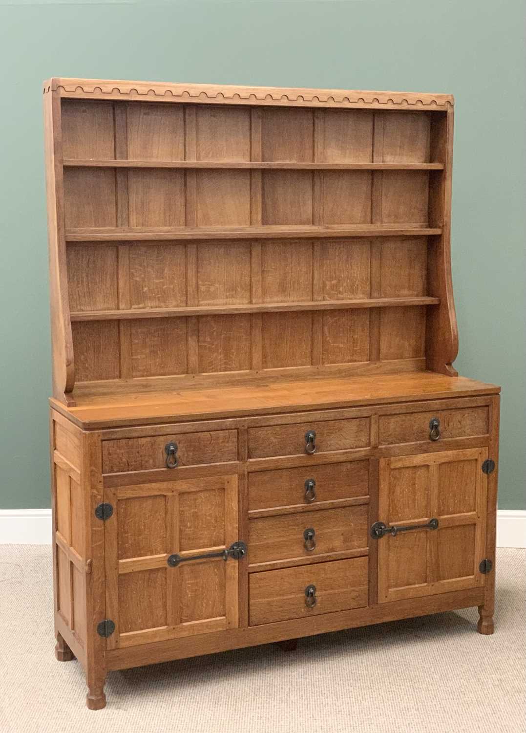 ROBERT "MOUSEMAN" THOMPSON (KILBURN) ADZED OAK 5ft DRESSER having a three shelf rack with carved