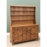 ROBERT "MOUSEMAN" THOMPSON (KILBURN) ADZED OAK 5ft DRESSER having a three shelf rack with carved