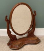 VICTORIAN MAHOGANY DRESSING TABLE MIRROR, oval framed on carved supports, on a shaped base with