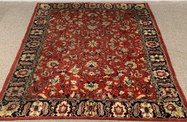 EASTERN STYLE RED & BLACK GROUND TRADITIONAL STYLE RUG with all over opposing floral central pattern